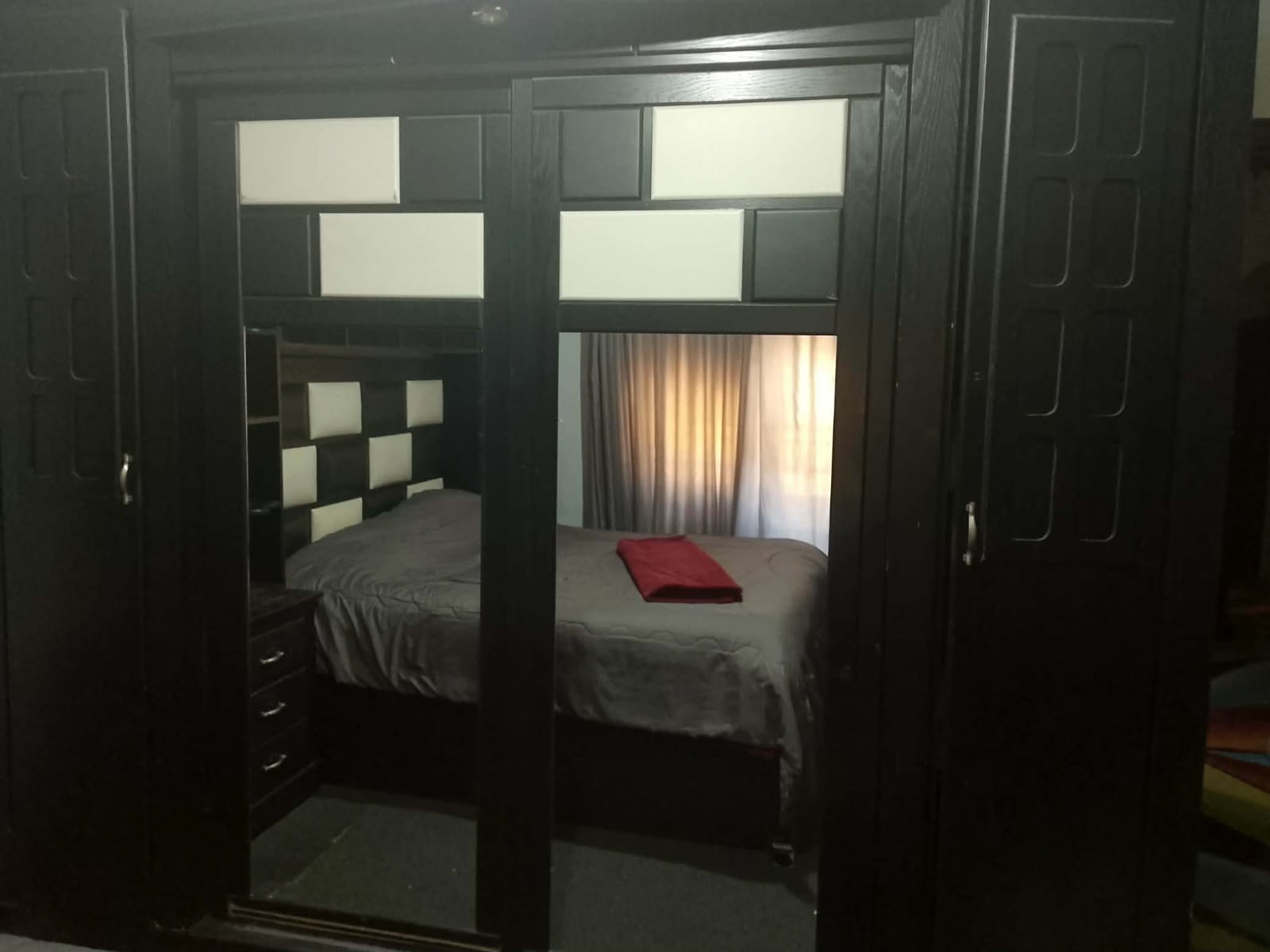 Bedroom set with wardrobe and bed